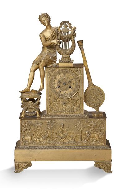 null IMPORTANTE PENDULE BORNE en bronze ciselé et doré représentant Orphée jouant...