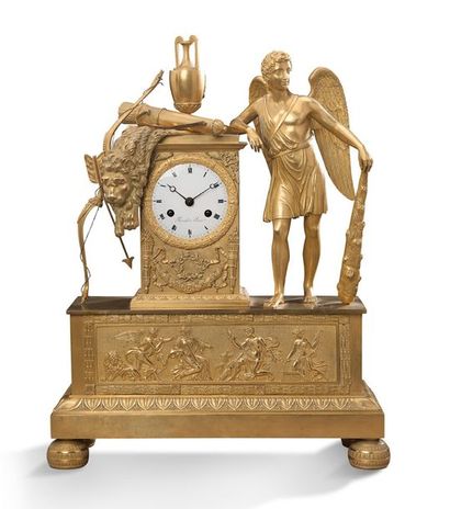  PENDULE BORNE en bronze ciselé et doré ornée de la figure d'Hercule et de ses attributs....