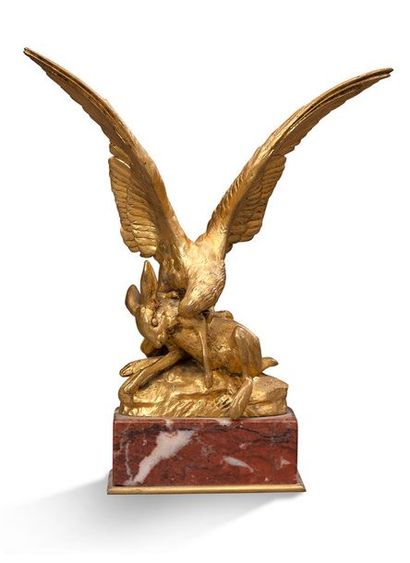 Antoine-Louis BARYE (1795-1875). Aigle attaquant un lièvre.
Bronze à patine dorée....