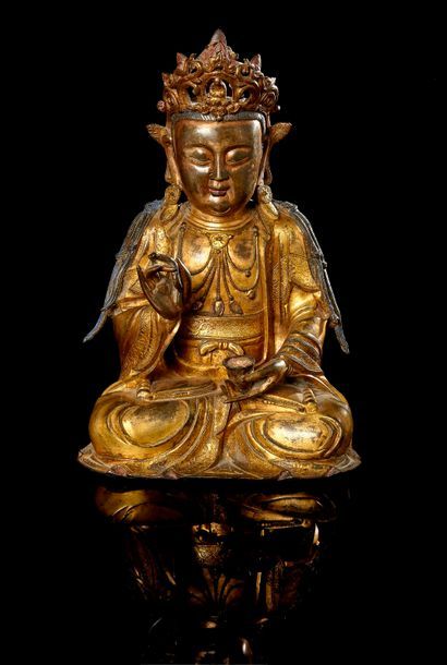 null STATUETTE EN BRONZE DORÉ

représentant le boddhisattva avalokitesvara assis...