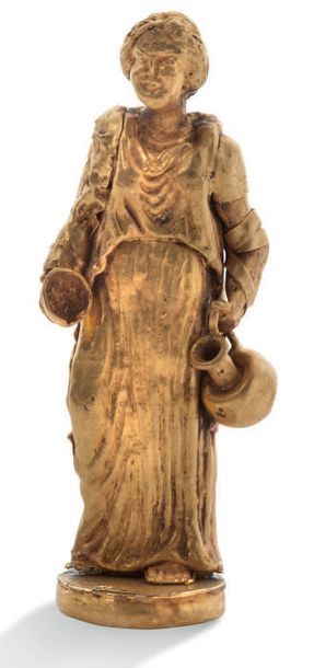 null STATUETTE FÉMININE DRAPÉE. ART ROMAIN (? )
A POSSIBLY ROMAN GOLD FIGURE OF A...