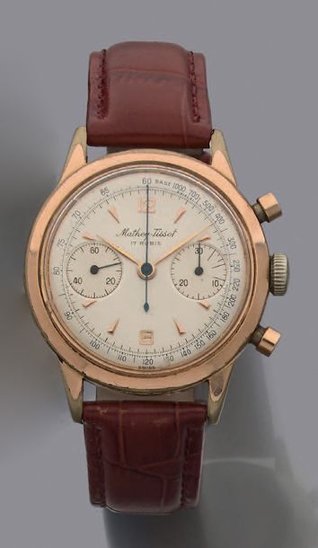 MATHEY TISSOT Vers 1950. Chronographe en plaqué or 2 compteurs.
Cadran argenté, chiffres...