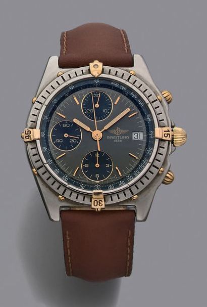 BREITLING Chronomat
Vers 2000.
Modèle homme chronographe en or/acier.
Cadran gris...