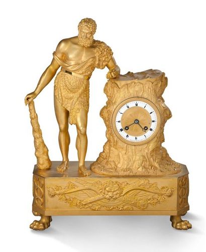null PENDULE en bronze ciselé doré représentant Hercule adossé à un tertre. Le cadran...