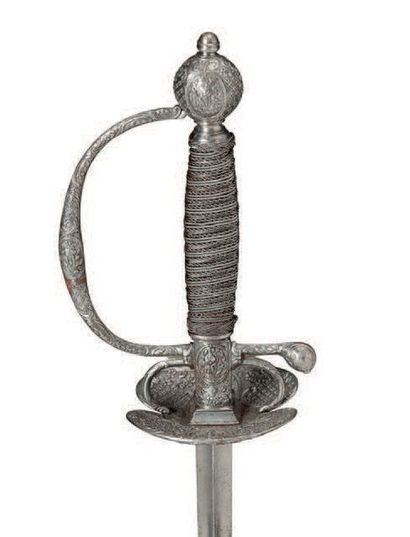 null Epée de cour, datée 1757.
Court sword XVIIIth c.
Monture en argent à coquille...