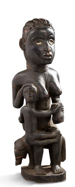 DEBUT XXE SIECLE Importante statue Vili du Congo figurant une femme sur un éléphant.
Hauteur:...