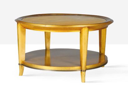 ANDRÉ ARBUS (1903-1969) & MAX INGRAND (1908-1969) Table
Chêne, verre, laiton 63.5...