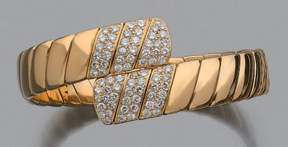 CARTIER Bracelet souple, diamants ronds et or 18K (750).
Signé et numéroté.
Pb.:...