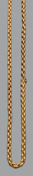 CARTIER "Épi"
Ensemble collier et bracelet formant sautoir, or 18k (750)
Signés numérotés...