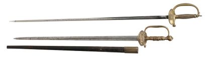 null Lot de deux épées.
Set of two Swords: one Officer's Sword, model 1872; and one...