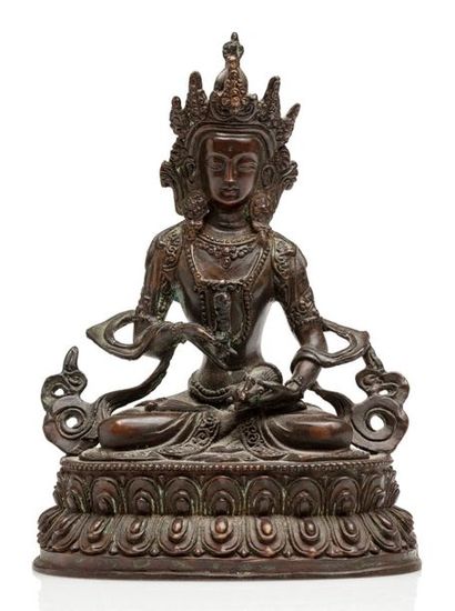 TIBET Sujet en bronze de belle patine brune représentant Vajrasattva assis en méditation...