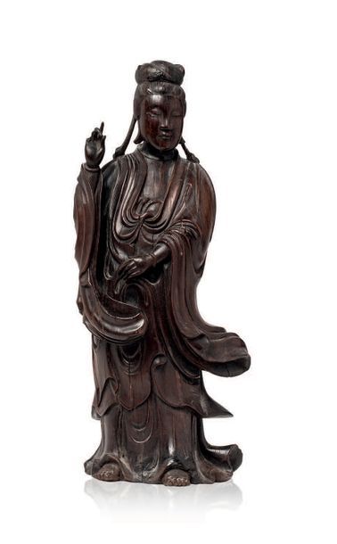 Chine XIXe siècle Sujet en bois de patine foncée, représentant la déesse Guanyin...