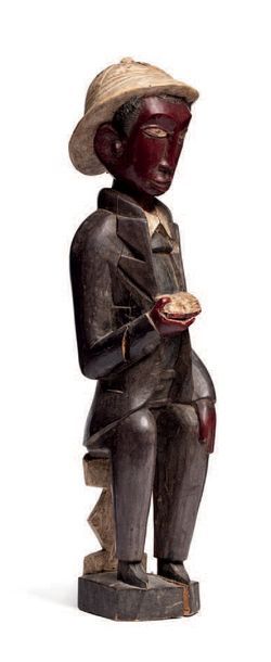 CÔTE D'IVOIRE Statue «Colon» BAOULE représentant un homme noir en costume, présentant...