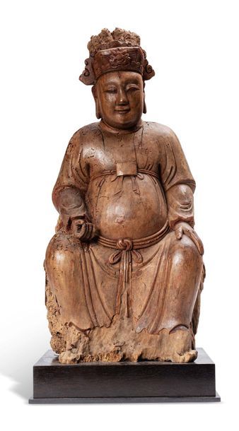 CHINE XVIIe-XVIIe SIÈCLE Sujet en bois sculpté avec traces de polychromie, représentant...