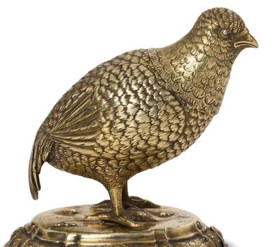 RÉCIPIENT À BOIRE 
BREAKING RECOVERY in the shape of a quail in repoussé and gilded...