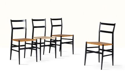 Gio PONTI (1891-1979) 
Suite de 4 chaises 646/2 dit La Leggerra
Bois, rotin
82 x...