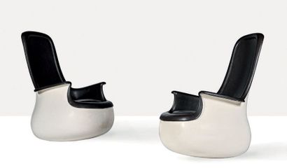 MARC HELD (1932) Set of 2 culbuto lounge chairs
Molded fiberglass, leather
45.28...