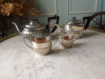 Silver plated metal tea service part including...