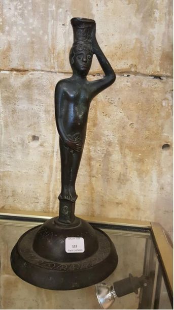 Candlestick representing a chaste Adam, patinated...