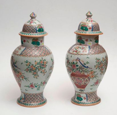 Pair of covered baluster-shaped vases decorated...
