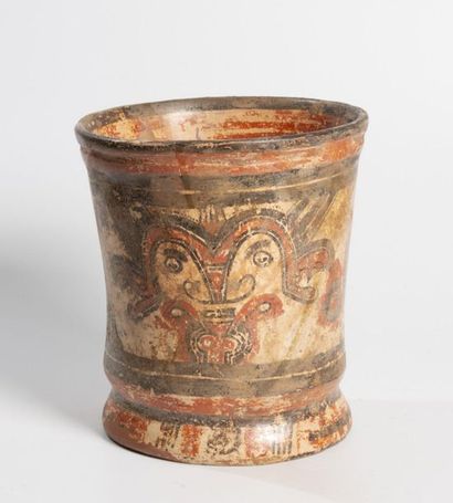 Flared vase decorated with two faces of deities...