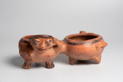 Anthropomorphic double cup - one depicts...