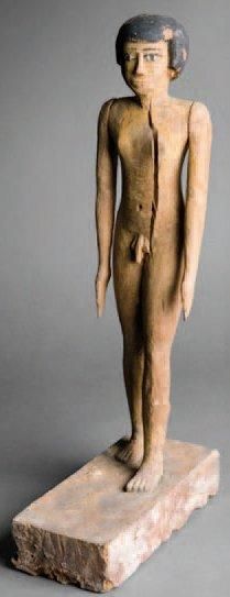 EGYPTE Statuette masculine représentant un homme debout, nu, les bras le long du...