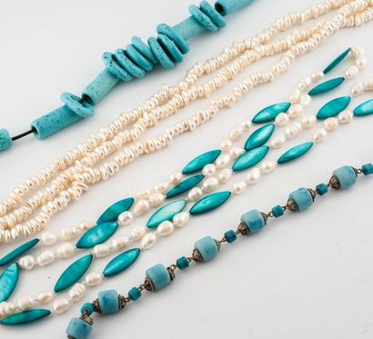 null Set of four necklaces in blue and white tones composed of cultured pearls, tinted...