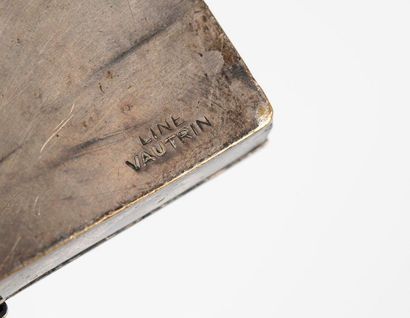 null Line Vautrin (1913-1987)

A square silver bronze powder case bearing the inscription...