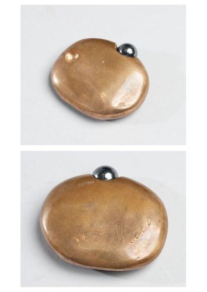 null Ado Chale (b. 1928), Pebble, cast bronze and hematite bead, signed Ado Chale,...