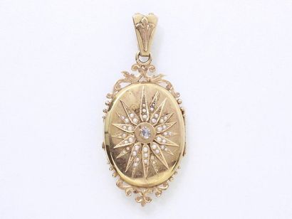 750-thousandths gold pendant holding an oval...