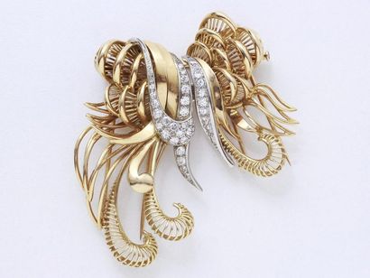 Double clip brooch in 750-thousandths gold,...