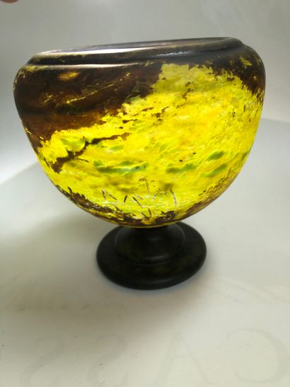 Glass vase on pedestal, gradient of green....