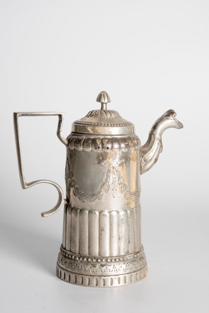 Pewter jug with ribs and garlands. 
Neo-classical...