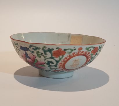 China 
Porcelain bowl resting on its wooden...