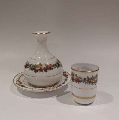  White opaline drinking set with polychrome floral decoration comprising a glass,...