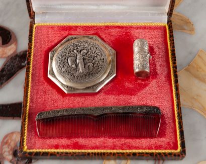 Silver metal beauty set comprising a small...