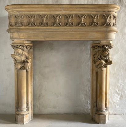 Neo-Gothic mantel. 
Lintel adorned with a...