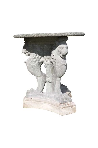  Tripod gueridon with lions decoration, in composite stone and marble mosaic. 
Circa...