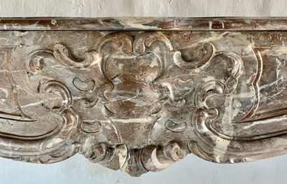  Louis 15 mantel 
Crossbow lintel decorated with rocaille and foliage. 
Console jambs...