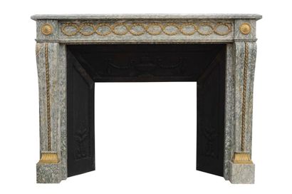  Louis XVI style mantel 
Lintel decorated with interlacing foliage and rosettes....