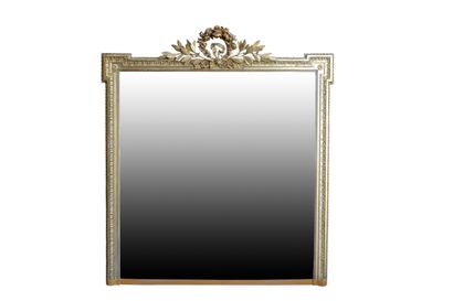 Miroir de style Louis 16 
Bordé d'une double...