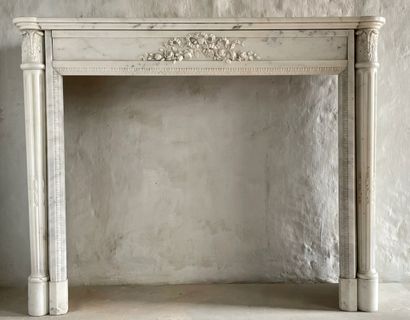 Louis XVI style mantel 
The finely carved...