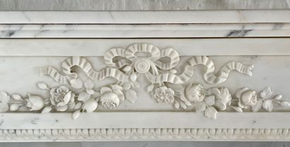  Louis XVI style mantel 
The finely carved lintel features a ribboned bow from which...
