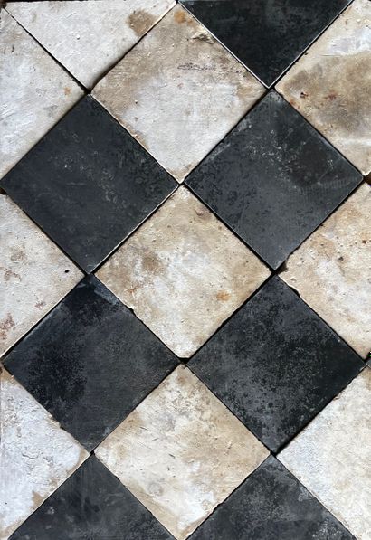 Stone and slate paving in a checkerboard...