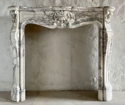 Louis 15 style mantel 
Lintel adorned with...