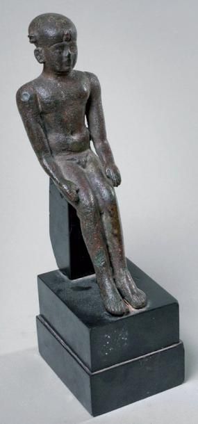Egypte Harpocrate assis le corps semi fléchi et les bras le long du corps. H: 17...