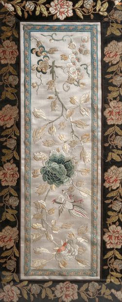  CHINA, early 20th century. Three embroideries representing flowering branches, cranes...