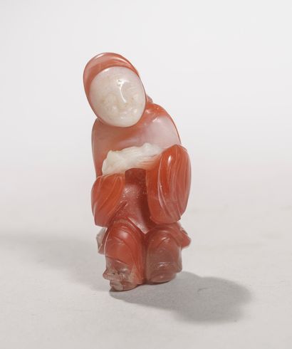 CHINA, 17th century. Small figure in two-tone...