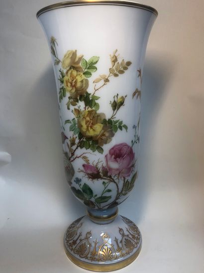 A white opaline vase with a rose decoration...